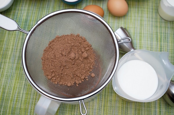 Pancakes with bird cherry flour sifting