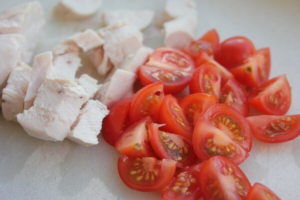 Pasta and chicken salad tomatoes
