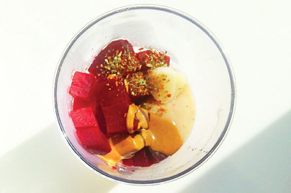 Beetroot hummus with beans and sunflower seeds